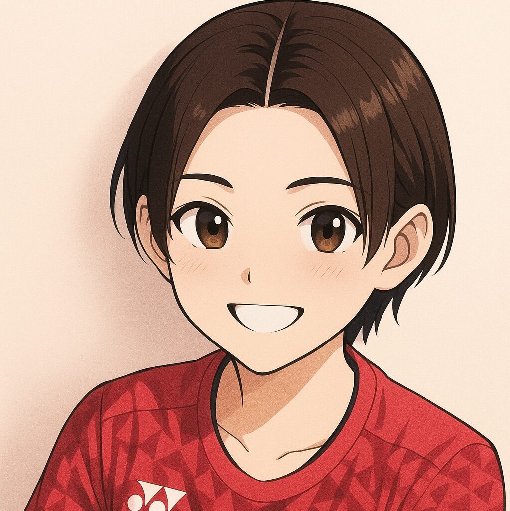 バドミントンのラケットを持って笑顔でカメラ目線の少女